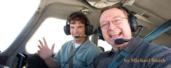 Photography of a young instructor and an older student in the cockpit of a Piper Cherokee.
Wichita, KS   USA